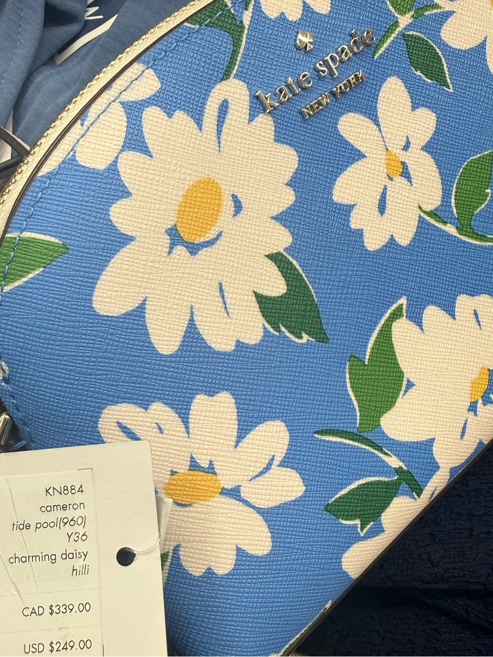 kate spade blue daisy print crossbody with gold trim